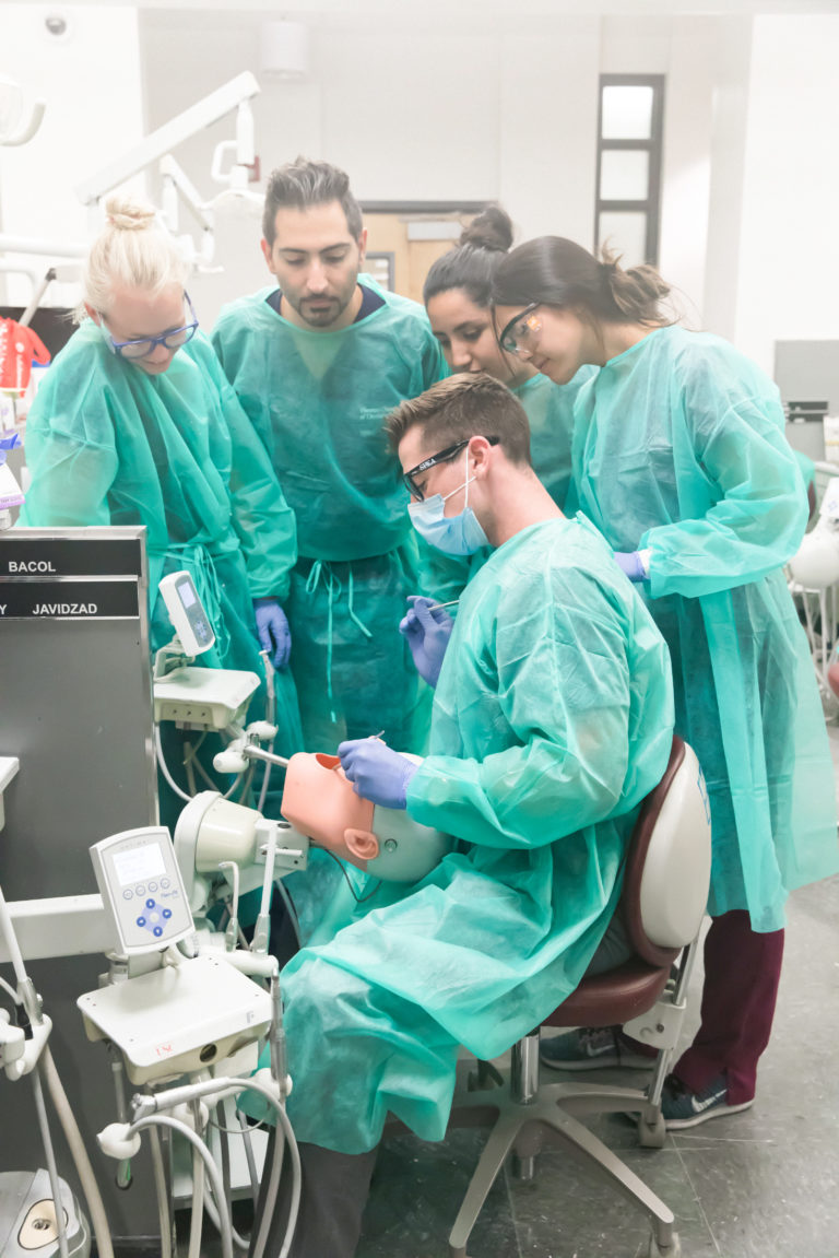 USC DDS students observe the preparation of a provisional