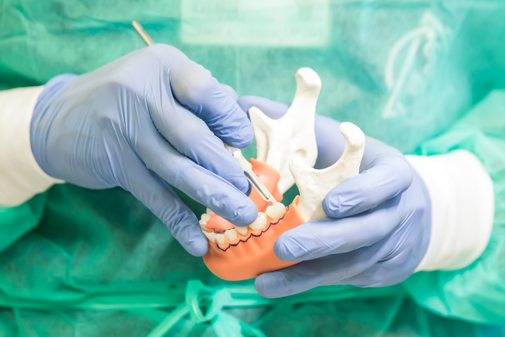 <em>Left:</em> USC DDS students mix dental stone to create dental models. <em>Right:</em> Periodontal osseous surgery exercise.  | NATE JENSEN