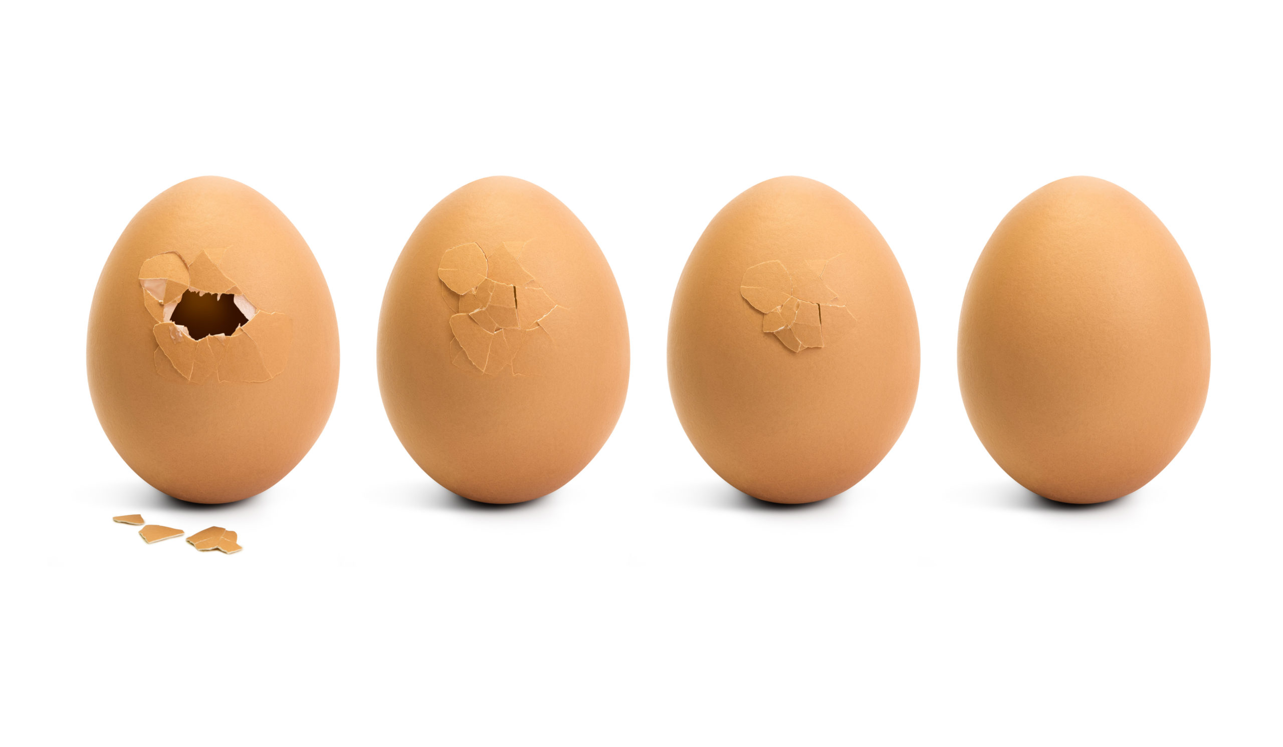 Four eggs, one with crack each successive eggs heals