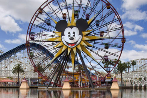 ferris wheel at Disneyland with Mickey's face in the center