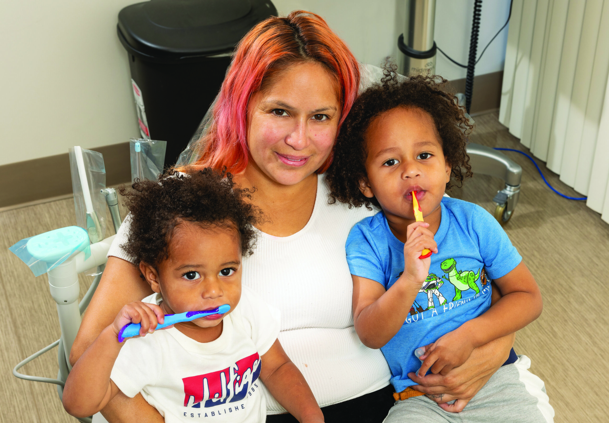 Portrait of Cassandra Cazaras and two of her three children, Mulogic aged 1 and Za aged 3